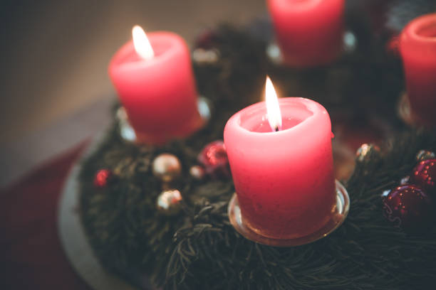 istock Traditional Christmas decoration: Advent wreath with red lights 1157133390