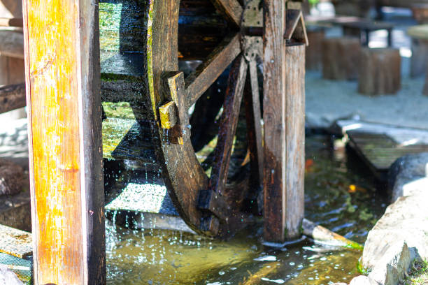 istock Waterwheel and garden in Japan 1157136070