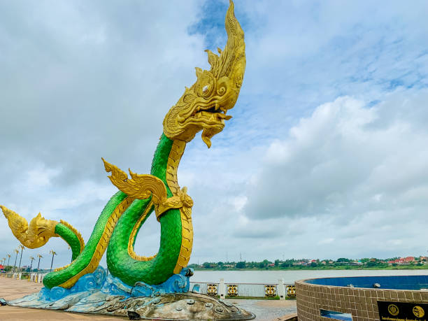 Phayanak or Naga king of snake Statue at the mekong river Nong Khai, Thailand - June 2019 : Phayanak or Naga king of snake Statue at the mekong river in the town of Nong Khai Province in Isan area on north east region of Thailand. nong khai stock pictures, royalty-free photos & images