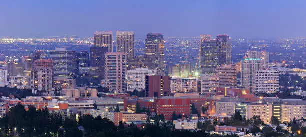 High angle view of the West Los Angeles Skyline. This area includes westwood - home to the University of California - and the neighborhoods of Beverly Crest and Holmby Hills. Further south are the skyscrapers of Century City - a modern neighborhood and business district and a a major feature of the skyline.