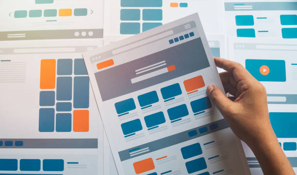 Website designer Creative planning application developer development draft sketch drawing template layout prototype framework wireframe design studio . User experience concept . diseñador de sitios web diseño de aplicaciones de planificación creativa desarrollo de desarrollo de proyecto de dibujo de boceto sin diseño de diseño de marco de diseño de estructura alámbrica estudio de diseño. concepto de experiencia de usuario.
