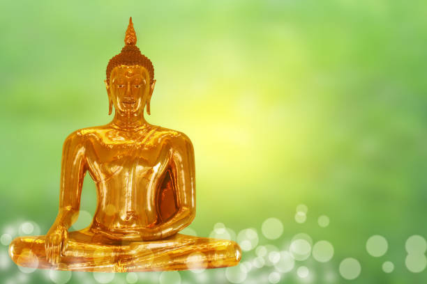 istock Golden Buddha statue on background religion sign. 1157139440