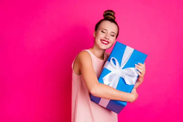 Portrait of charming lovely youth millennial have gift close eyes expect ribbon white pomade, dressed dress top-knot fashionable she her isolated pink background