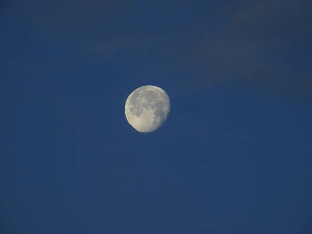 istock Blue sky background and big full moon in the middle 1157143820