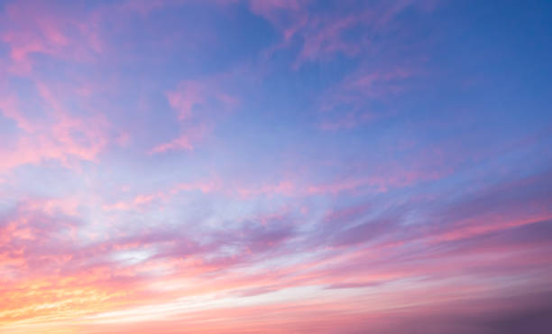 istock Beautiful sunset clouds in pink colors 1157143875