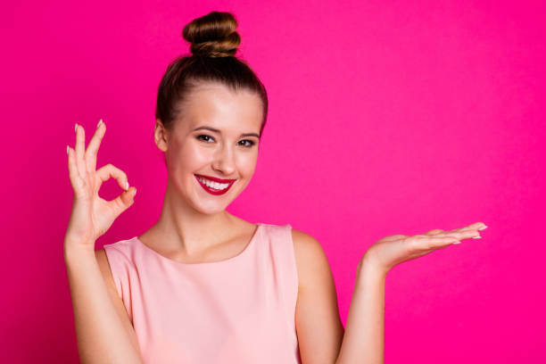 Portrait of magnificent attractive shiny youth people person toothy confident promoter adverts wear blouse fashionable top knot isolated pink colorful background Portrait of magnificent attractive shiny youth people person toothy confident promoter adverts wear, blouse fashionable top knot isolated pink colorful background topknot stock pictures, royalty-free photos & images