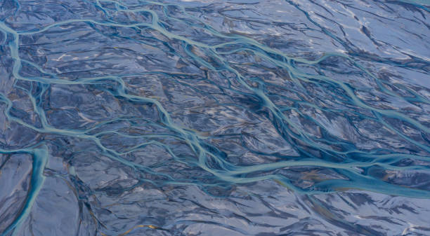 istock River bed shot from aerial view, Iceland 1157144024