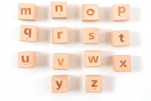 istock Alphabet on wood ,white background 1157144043