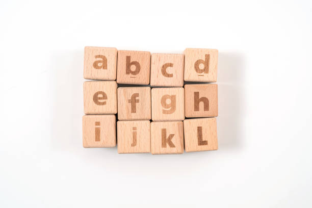 istock Alphabet on wood ,white background 1157144133