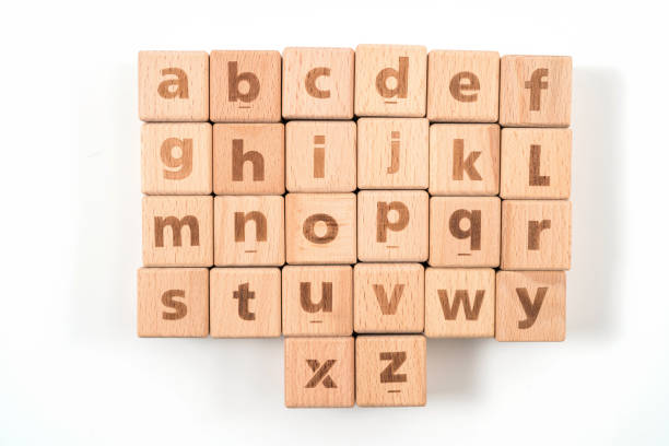 istock Alphabet on wood ,white background 1157144201