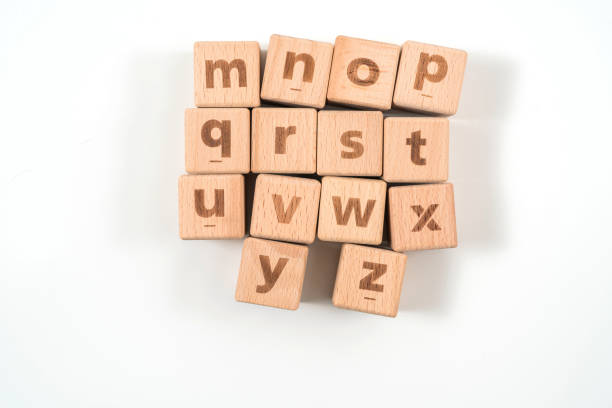 istock Alphabet on wood ,white background 1157144267
