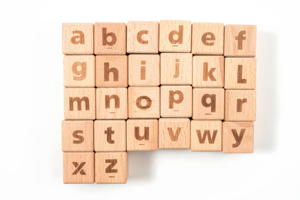istock Alphabet on wood ,white background 1157144911