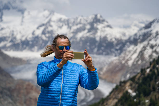 istock Mature Man Hiking the Swiss Mountains 1157145019