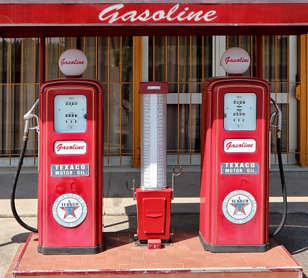 Pradamano, Italy. June 16 2019. Decorative vintage fuel pump Texaco in front of  Rock  60 club, recently opened