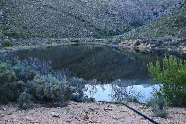 istock A dam filled with water. Water conservation concept image. 1157149986