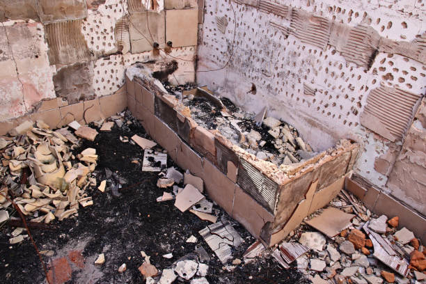 Burned interiors after fire of industrial or residential building. Fire consequences concept.