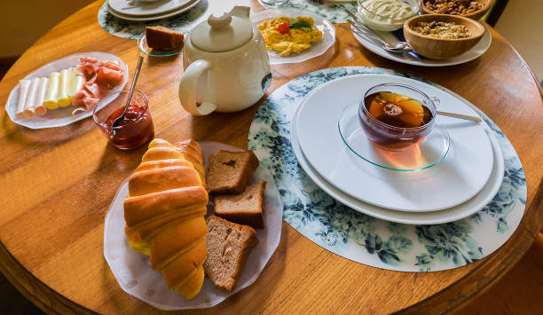istock Breakfast table with variety of foods and drinks 1157155398