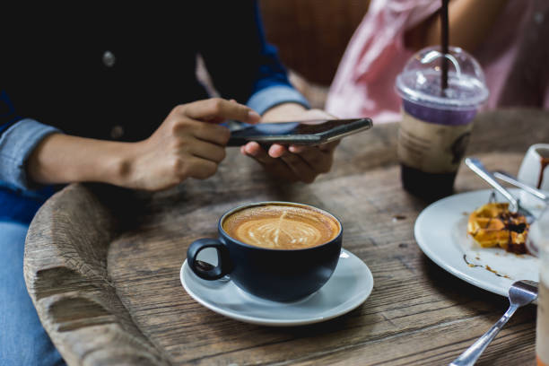 istock Lifestyle of people using internet at coffee cafe on holidays. 1157155411