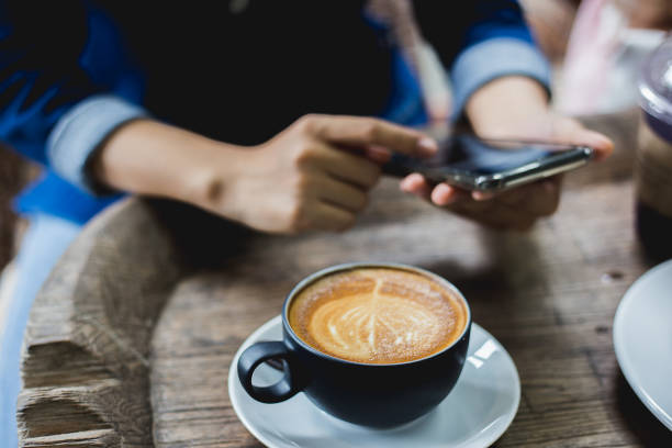 istock Lifestyle of people using internet at coffee cafe on holidays. 1157155413