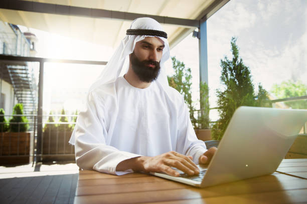 istock Arabian saudi businessman working outdoors 1157156334