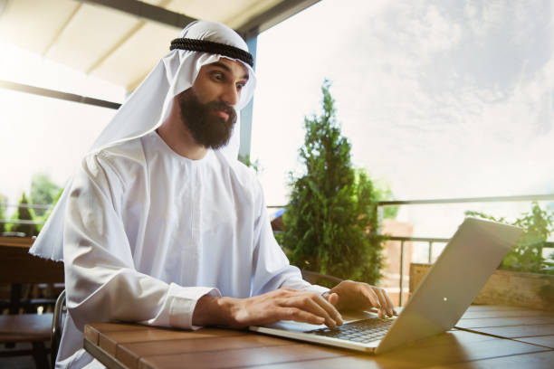 istock Arabian saudi businessman working outdoors 1157156337