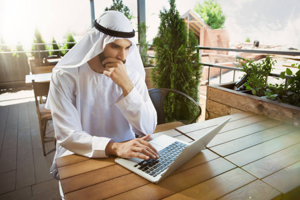 istock Arabian saudi businessman working outdoors 1157156342