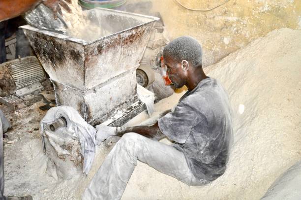 istock Side View Of Man Working Flour Mill 1157157042
