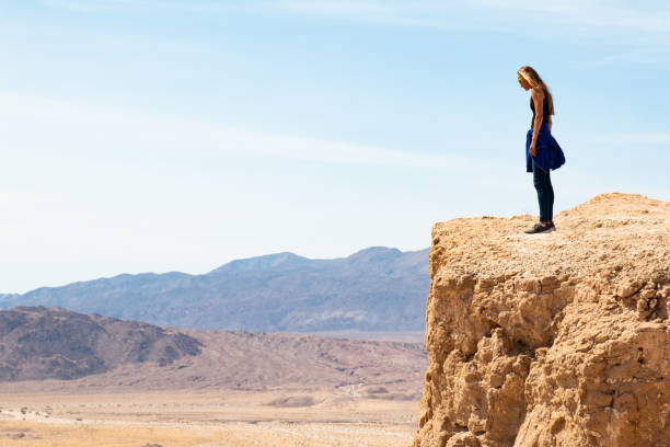 Scenic Overlook Woman at a scenic overlook in the desert fonts point photos stock pictures, royalty-free photos & images