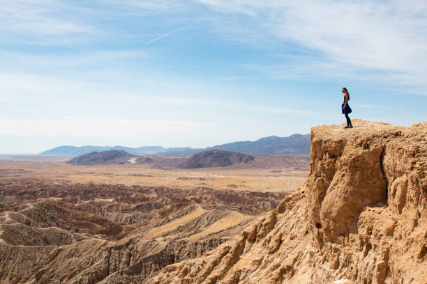 Scenic Overlook Woman at a scenic overlook in the desert anza borrego desert state park stock pictures, royalty-free photos & images
