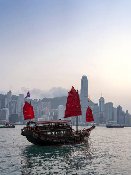 istock Hong Kong harbour with a traditional boat. 1157162740