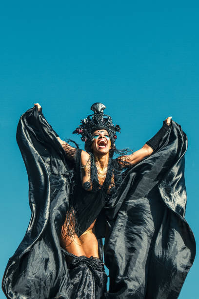 A close-up view of a beautiful Brazilian samba dancer holding a blank placard