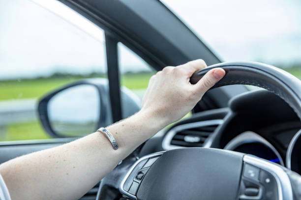 istock Women driving her car 1157163971