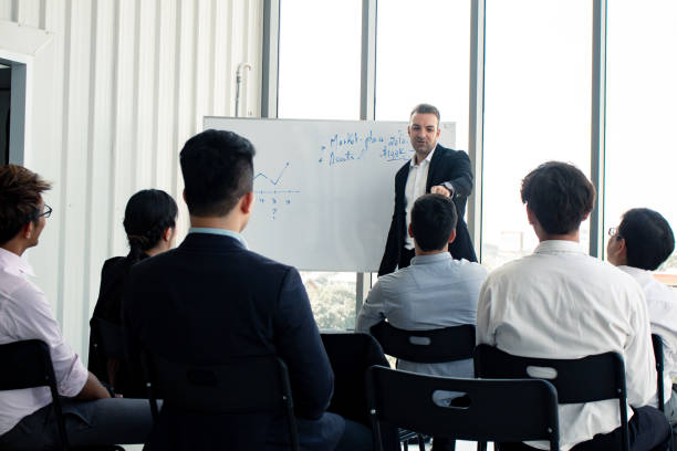 istock Chief explained that information on a whiteboard for employees. 1157166611