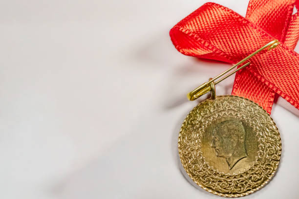 istock close up half Turkish gold lira on the white background 1157166643