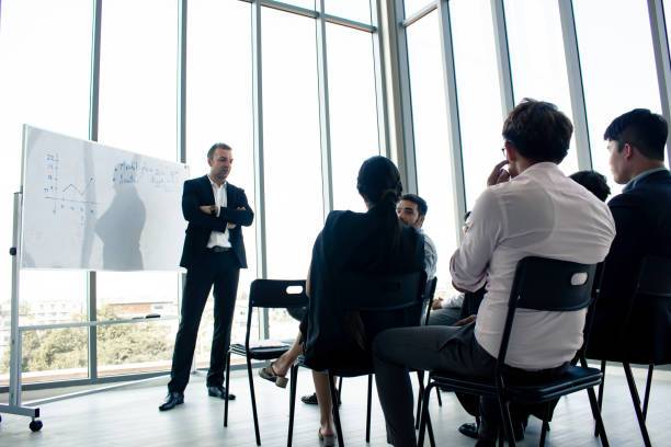 istock Chief explained that information on a whiteboard for employees. 1157167948