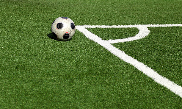 istock Soccer ball in stadium, corner- selective focus 115717019