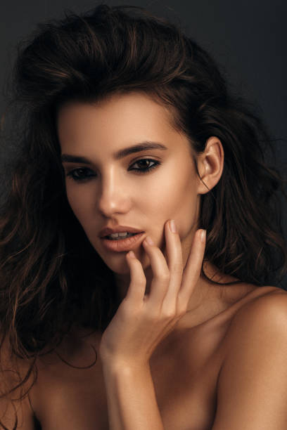 istock Young beautiful model with long wavy well groomed hair 1157171415