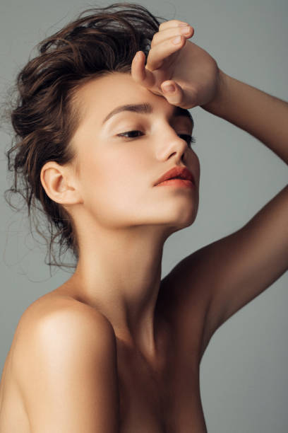 istock Young beautiful model with long wavy well groomed hair 1157172152