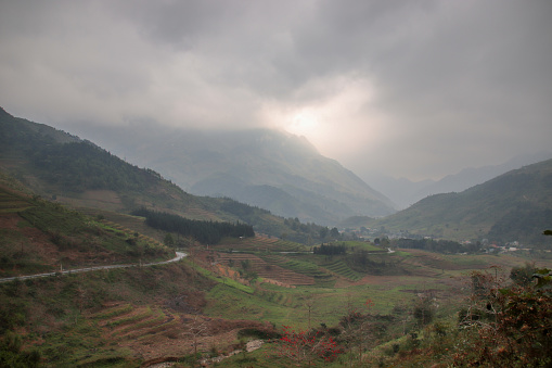 Winding mountain roads in Yen Minh which is a part of Dong Van Karst Plateau Geopark and part of the famous Ha giang Loop which is a popular road trip route for backpackers visiting North Vietnam