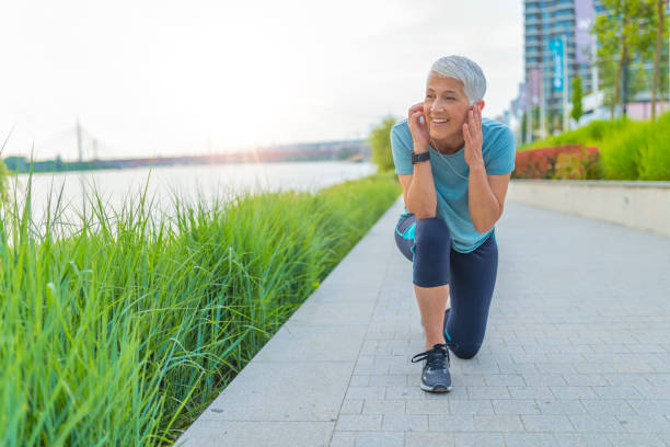 istock Athlete runner in sportswear relaxing getting inspired. 1157173718
