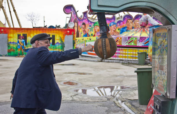 Istanbul, Turkey - April 14, 2013: An old boy having fun with toys in a public park, in istanbul, Turkey.