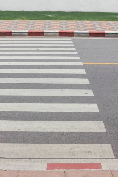 istock Crosswalk on the road Symbols for using across the road 1157179214