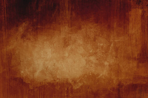 istock Dark orange grungy background with spotlight background 1157181221