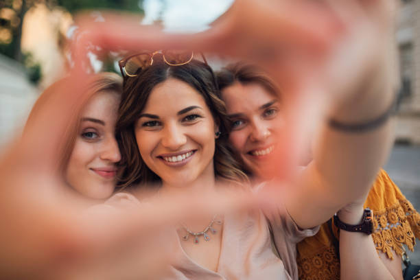istock Girls taking selfie and smiling 1157183926