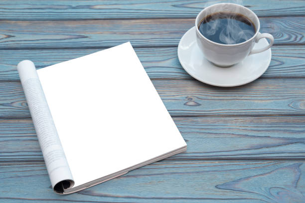 istock Open Blank catalog, magazines, book mock up on wood table with coffee 1157186537