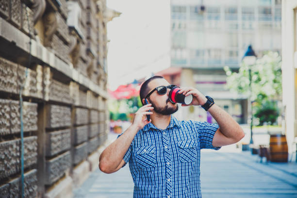 istock Young man talking on mobile phone 1157190495