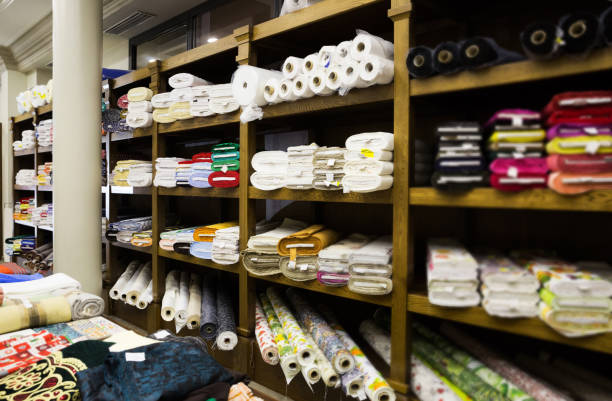 istock different fabric bolts exposed on shelves 1157191461