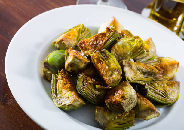 istock Sauteed in oil artichokes 1157191476