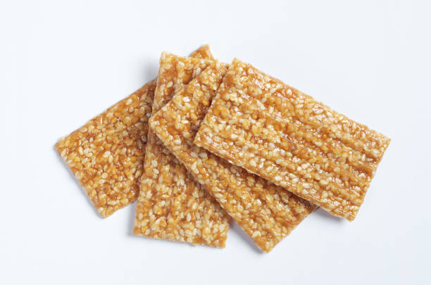 istock Sesame seed honey bar on white 1157192753