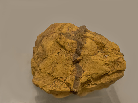 Picture of Yellow ochre, a oldest pigment isolated on a background.